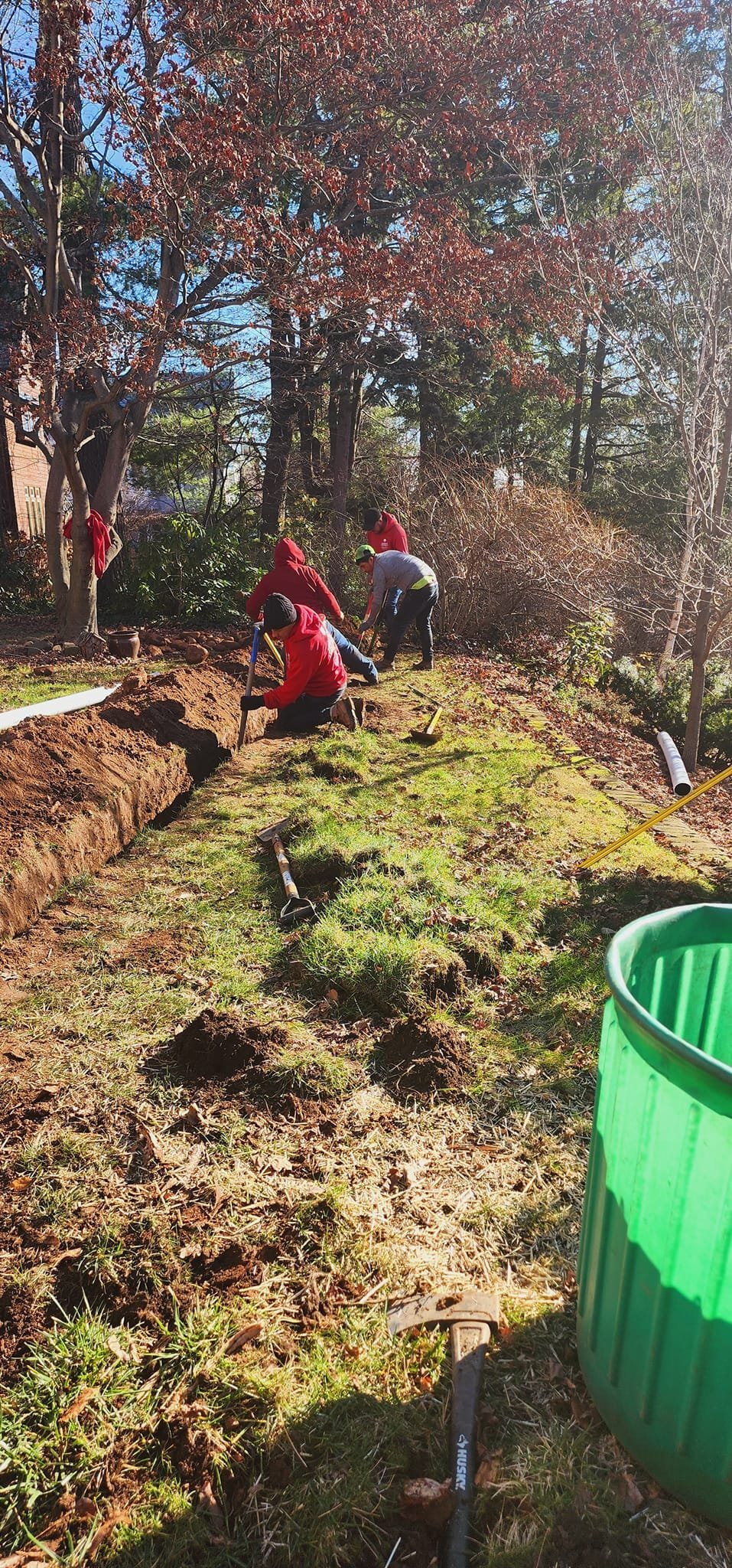 Lorenzo's crew working together on a landscaping project in Connecticut